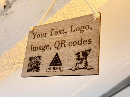Engraved wooden oak veneer sign with custom text, logo or QR code, displayed on a white natural rope loop against a clean neutral background